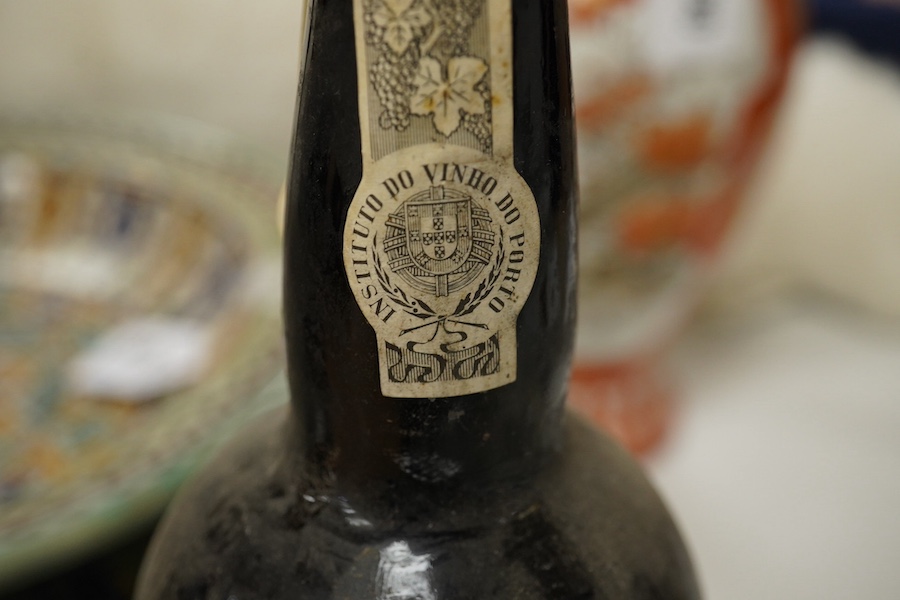 A bottle of Taylor's Quinta De Vargella 1972 vintage port. Condition- worn